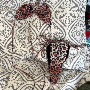 Berry Swimwear multi-way Top: XS, Bottom: Small. Both pieces come together.